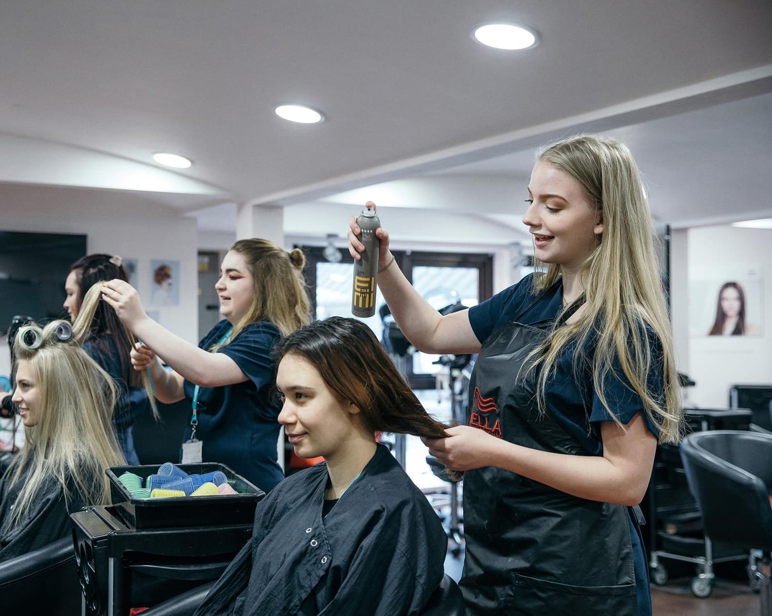 Hair and beauty students practising salon skills